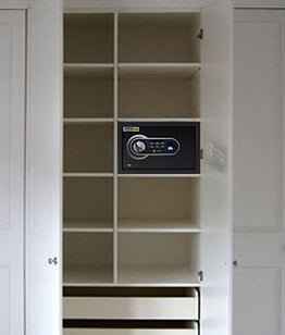 Digital Biometric Locker EB-25 black security safe installed in white closet shelving for home use