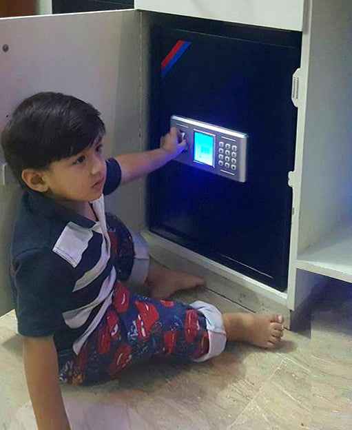 Child using KSPSafe&Vault Digital Locker ED-50 security safe with digital keypad and blue display