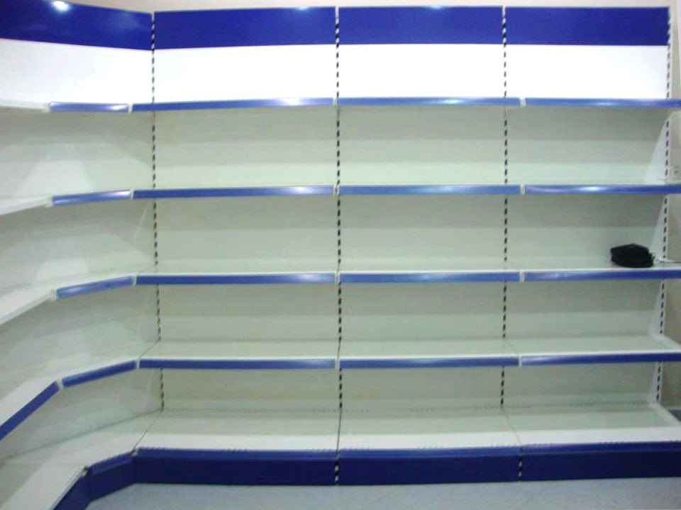 KSP white wall shelves and ledges with blue trim designed for supermarket shelving and display