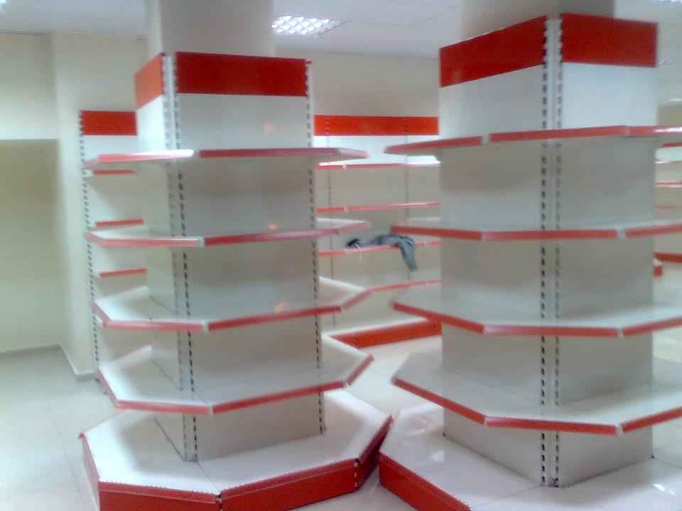 KSP white and red supermarket shelving wall shelves and ledges with multiple tiers for displaying products