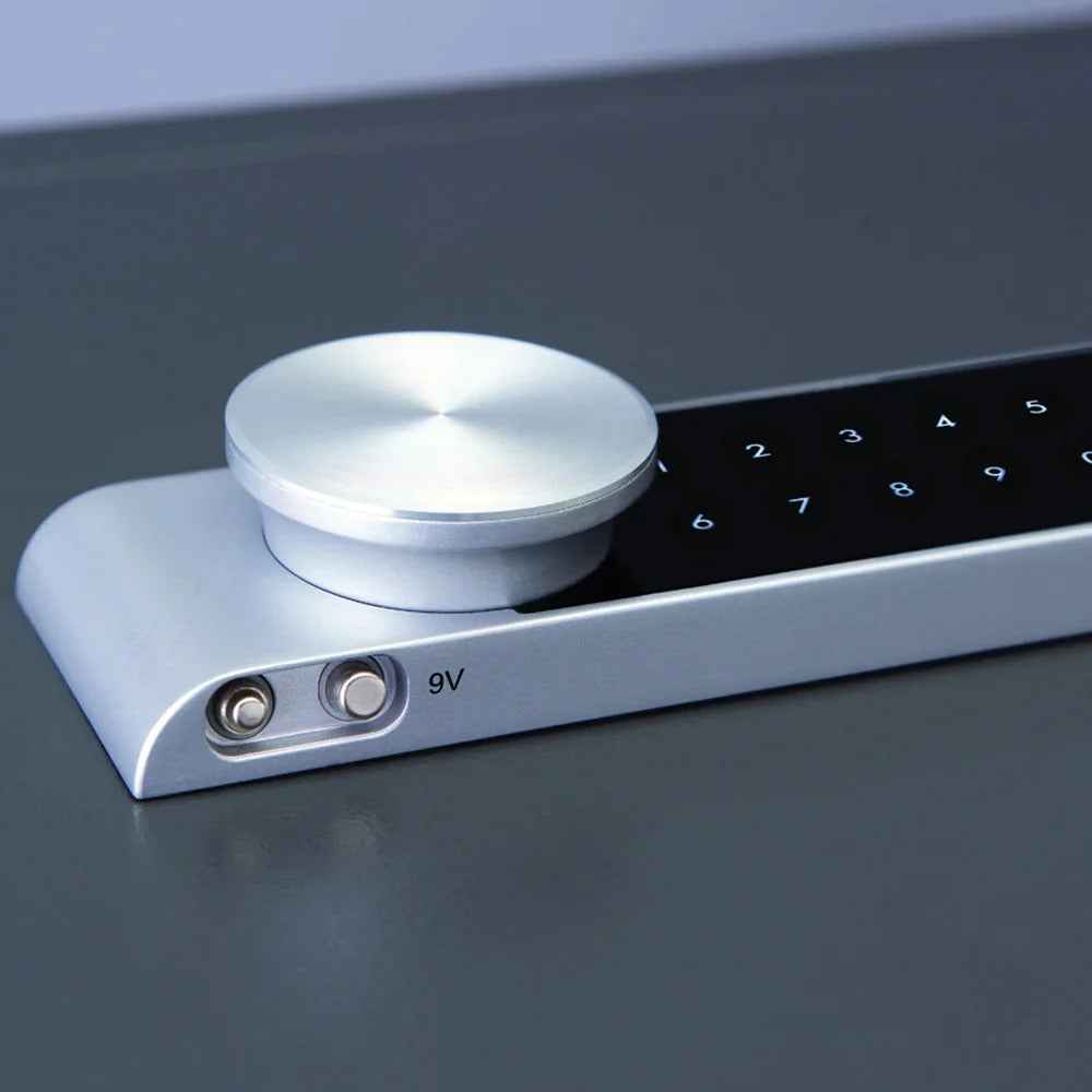 Yale Electronic Office Fire Safe Locker Box keypad with a round dial and power input for secure access